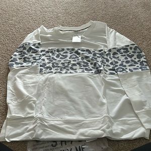 Brand new w/ tags white long sleeve w/ grey cheetah print
